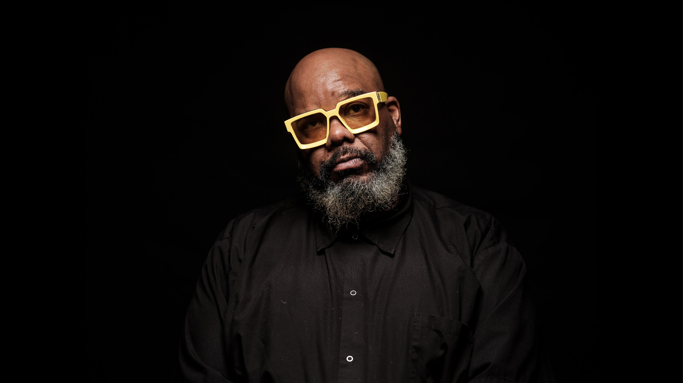 Headshot of Kokayi Walker, host of the F|M Podcast